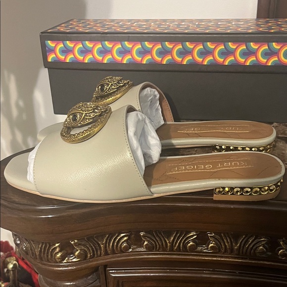 Kurt Geiger Cream Mules with Gold Emblem - Picture 2 of 6